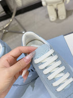 PRADA 26S LACE UP SNEAKERS IN LIGHT BLUE NYLON AND SUEDE