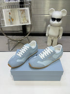 PRADA 26S LACE UP SNEAKERS IN LIGHT BLUE NYLON AND SUEDE
