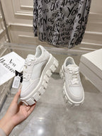 PRADA 26S GEAR SOLE SNEAKERS IN WHITE SUEDE AND MESH